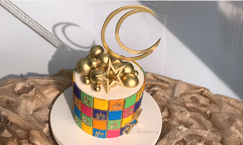 Ramadan crescent custom cake with gold moon topper, decorative elements, and elegant fondant cake design for Ramadan events and gatherings.